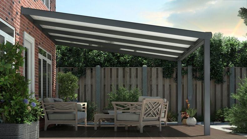 Vista laterale di una Veranda moderna antracite 7016, dimensioni 4,06 x 3,5 metri con tetto in policarbonato opale. Pergola/Gazebo elegante e resistente alle intemperie, ideale per spazi esterni raffinati e confortevoli, offre protezione UV ed è facile da montare.