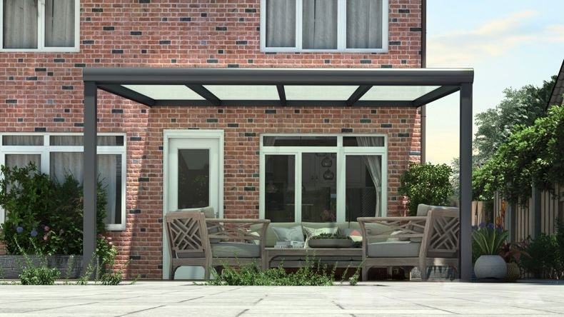 Vista Frontale di una Veranda moderna antracite 7016, dimensioni 4,06 x 3,5 metri con tetto in vetro opale. Pergola/Gazebo elegante e resistente alle intemperie, ideale per spazi esterni raffinati e confortevoli, offre protezione UV ed è facile da montare.